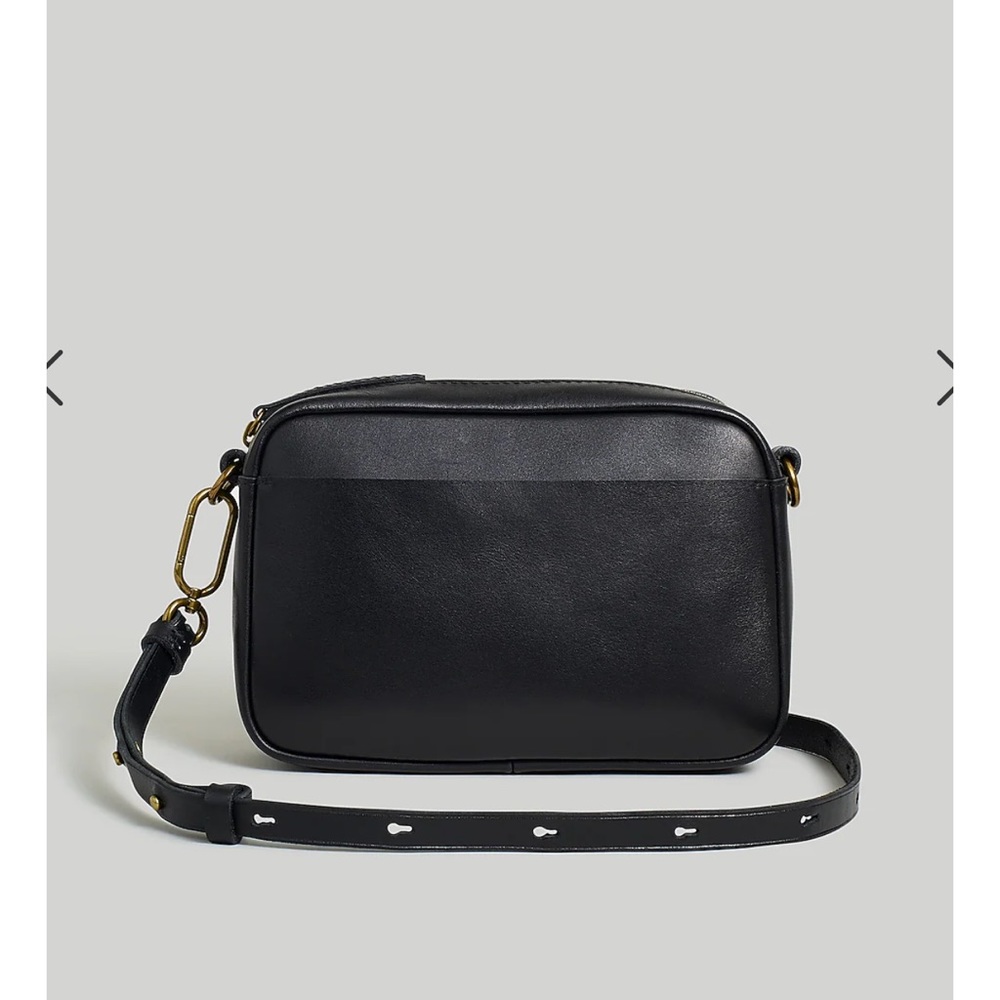 The Leather Carabiner Mini Crossbody Bag- black new but no tags.